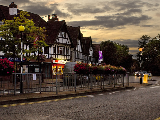 Old Coulsdon shopping parade at dusk. The street, not a labelled photograph of this counter.